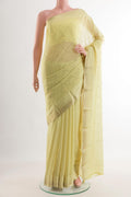 Lemon Yellow Mysore Chiffon Saree with Embroidery on the body and Zari Border.  displayed on a mannequin
