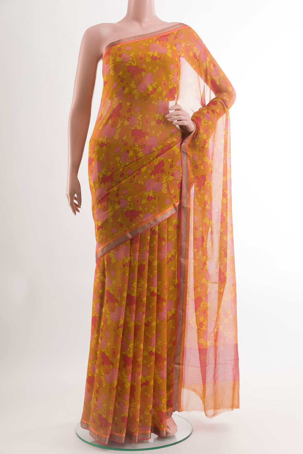 Yellow Chiffon Saree with Printed design on the body and Zari Border.  displayed on a mannequin
