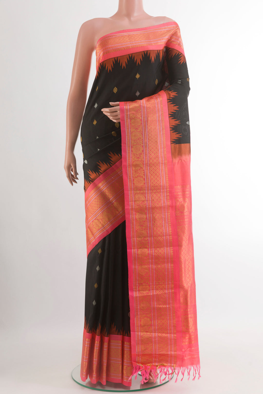 Black Gadwal Silk Saree with Zari Butta on the body and Zari Border.  displayed on a mannequin