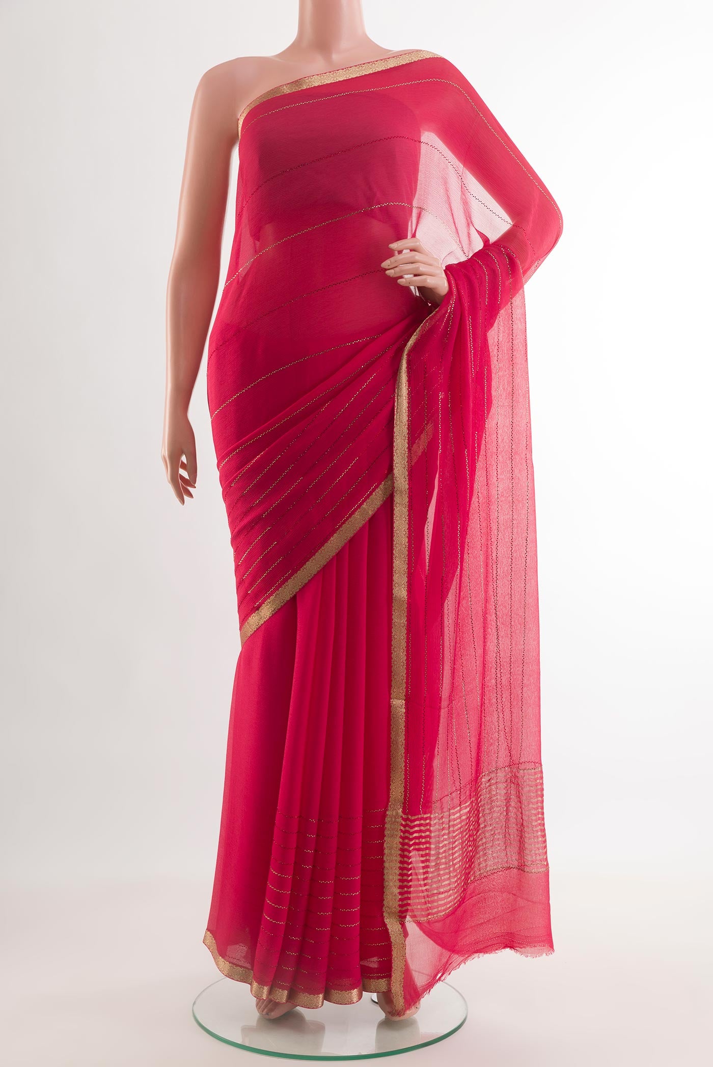 Pink Mysore Chiffon Saree with Stripes on the body and Zari Border.  displayed on a mannequin