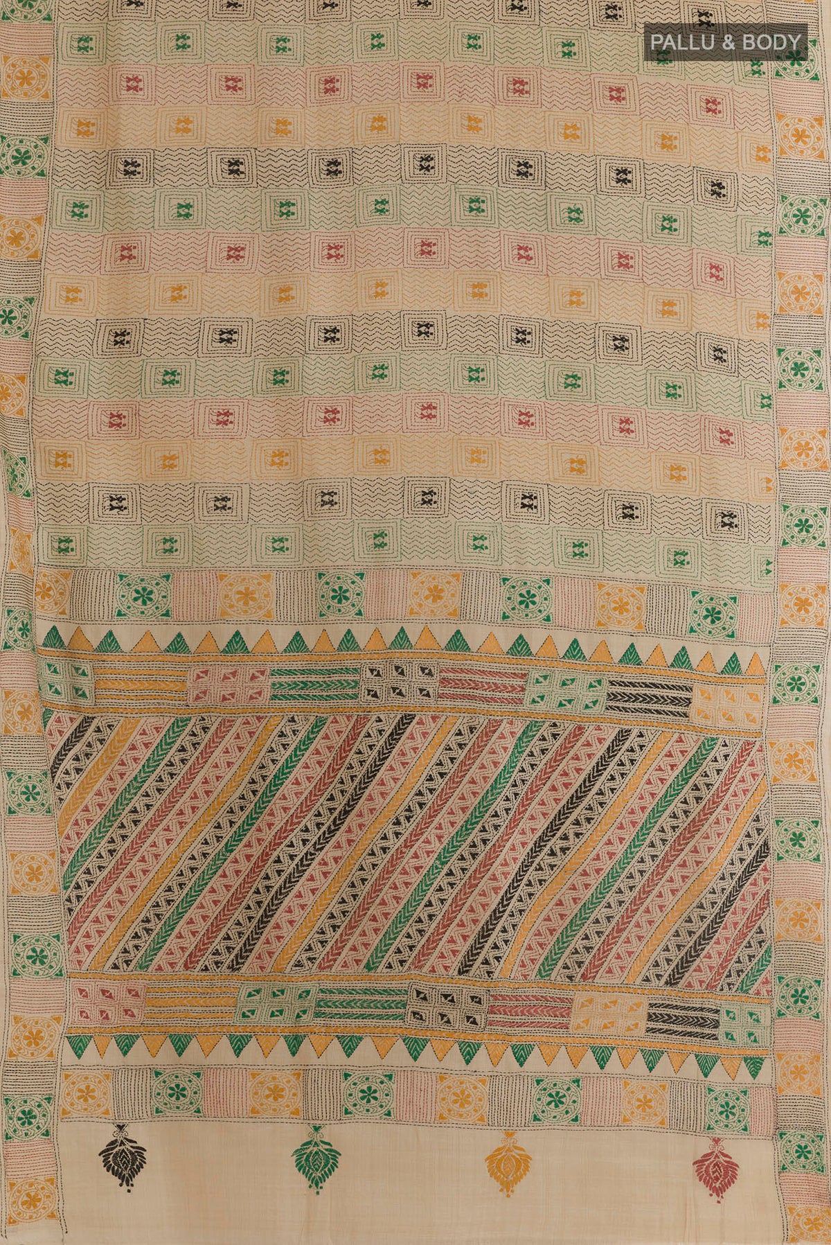 Flat view of Beige Tussar Saree with Kantha Work on the body and Embroidery Border. 