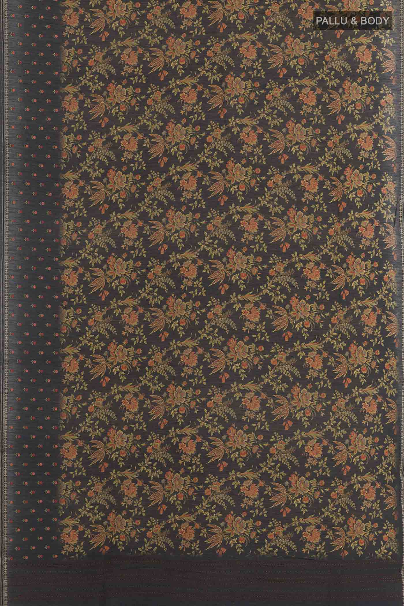 Flat view of Pure Silk Pure Zari Black Tussar Saree with Printed design on the body and Zari Border. 