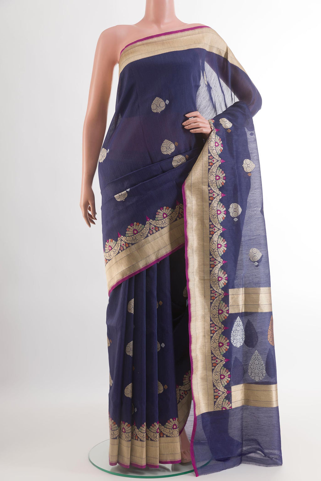 Navy Blue Banarasi Kora Silk Saree with Zari Butta on the body and Zari Border.  displayed on a mannequin