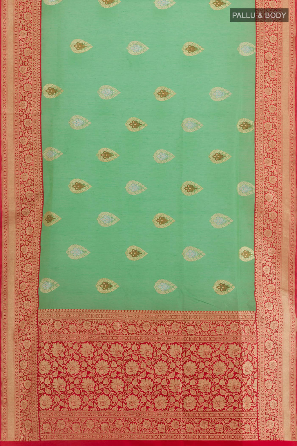 Flat view of Sea Green Banarasi Kora Silk Saree with Zari Butta on the body and Zari Border. 