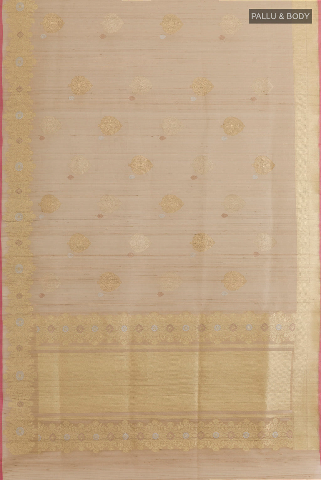 Flat view of Beige Banarasi Tussar Silk Saree with Zari Butta on the body and Zari Border. 