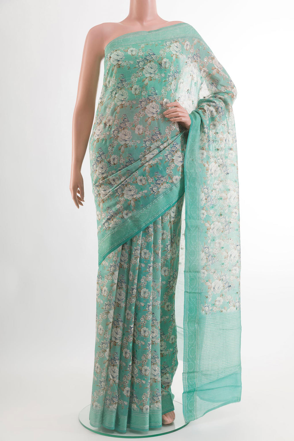 Blue Blended Chanderi Silk Cotton Saree with Zari Butta on the body and Zari Border.  displayed on a mannequin