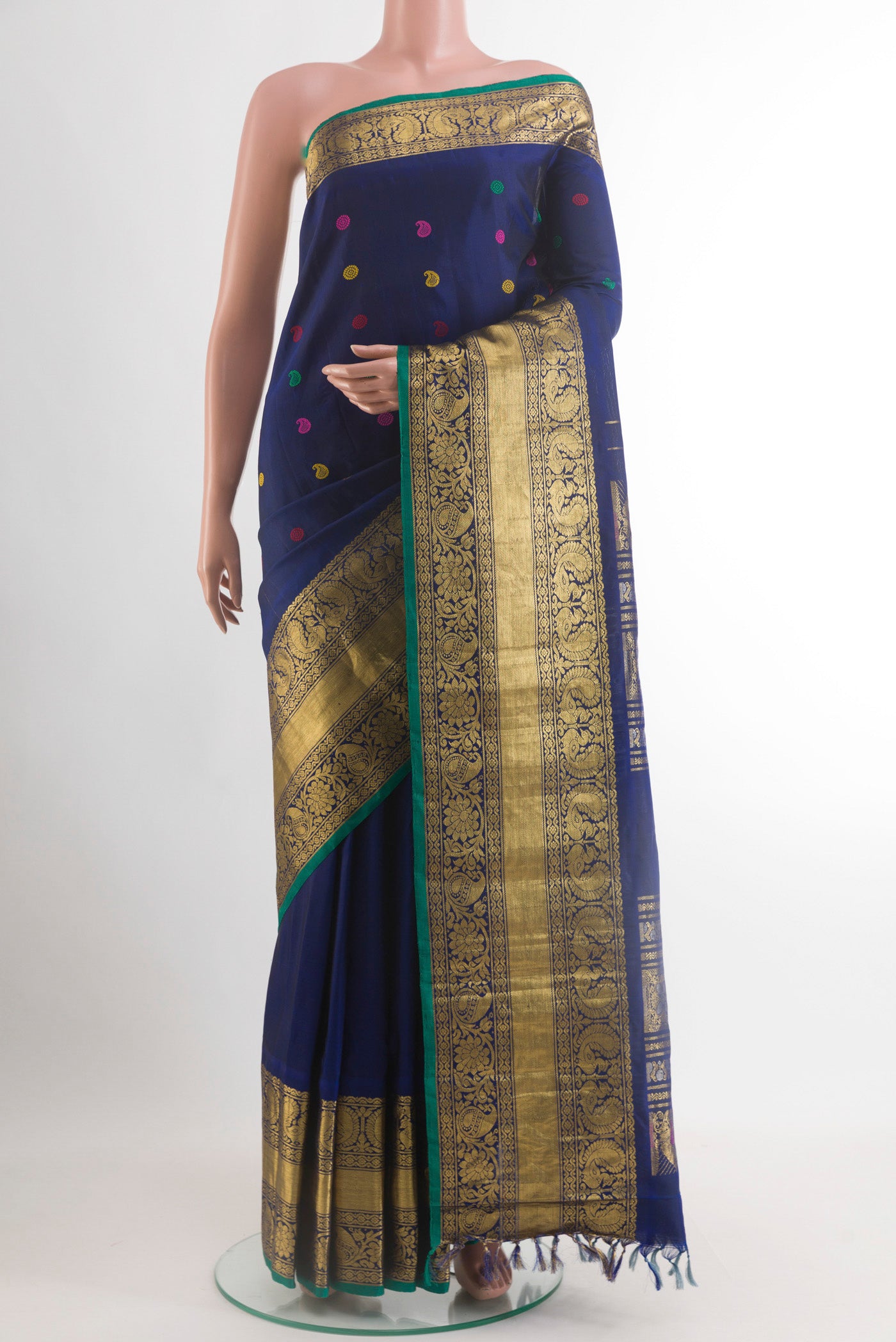 Navy Blue Gadwal Silk Saree with Thread Butta on the body and Zari Border.  displayed on a mannequin