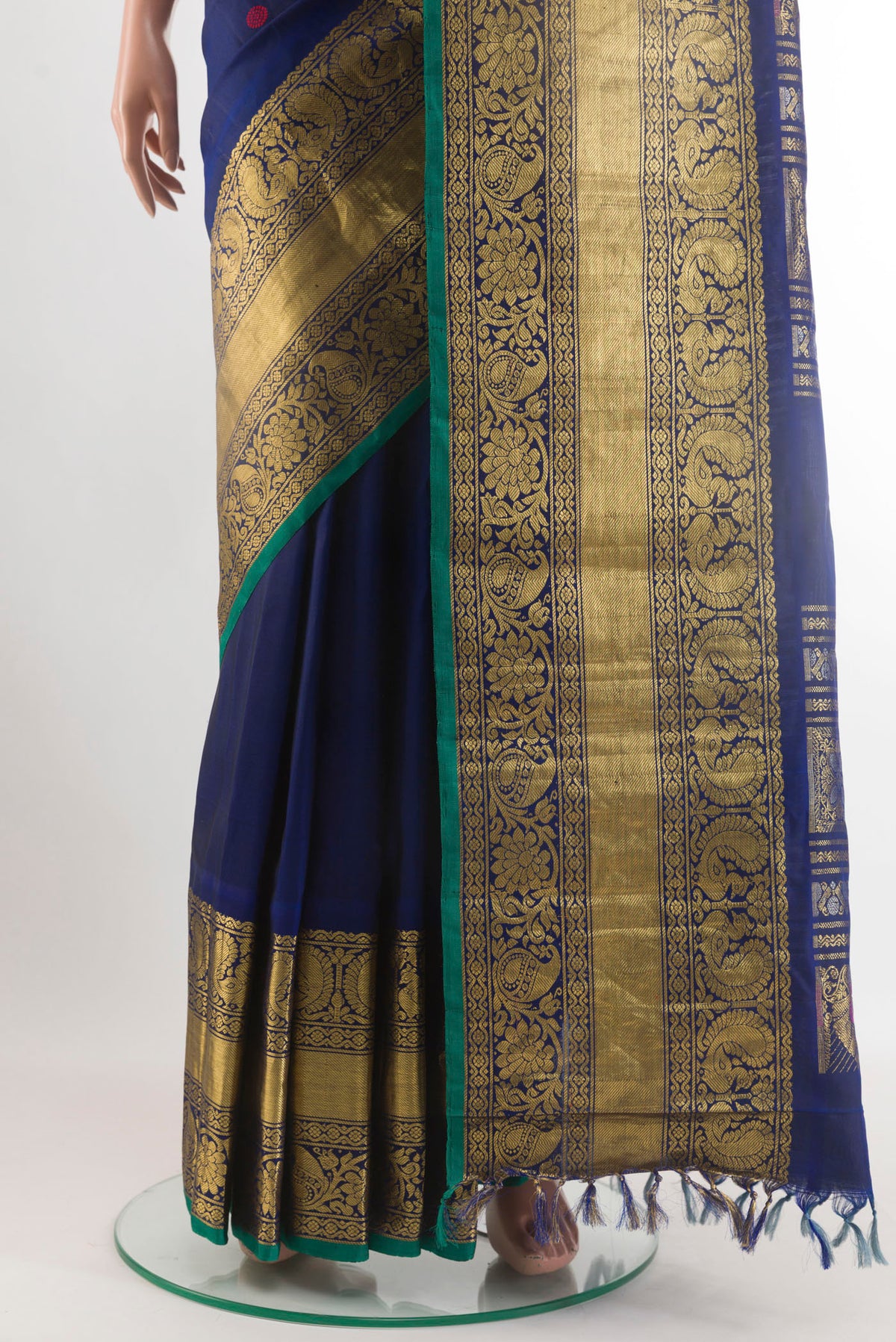 Pleats and pallu of Navy Blue Gadwal Silk Saree with Thread Butta on the body and Zari Border. 