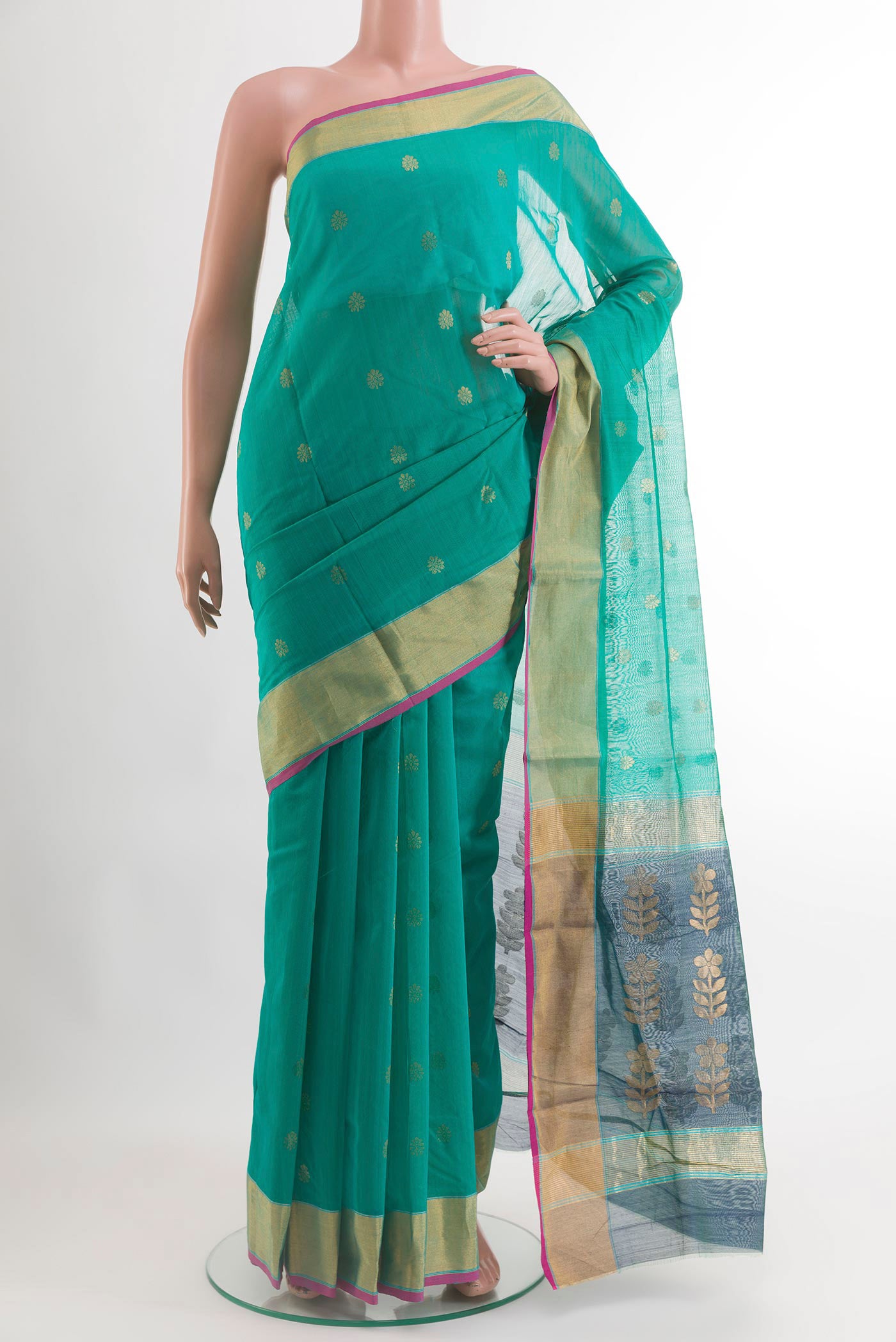 Sea Green Chanderi Silk Cotton Saree with Zari Butta on the body and Zari Border.  displayed on a mannequin