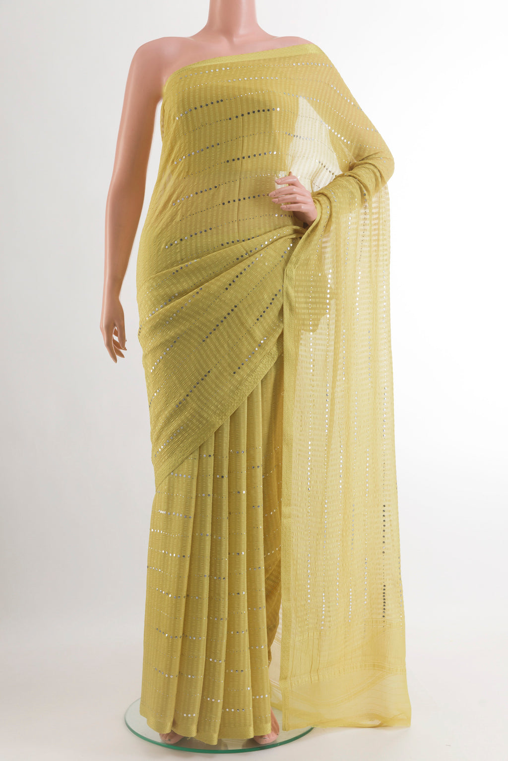 Yellow Mysore Chiffon Saree with Embroidery on the body and Zari Border.  displayed on a mannequin