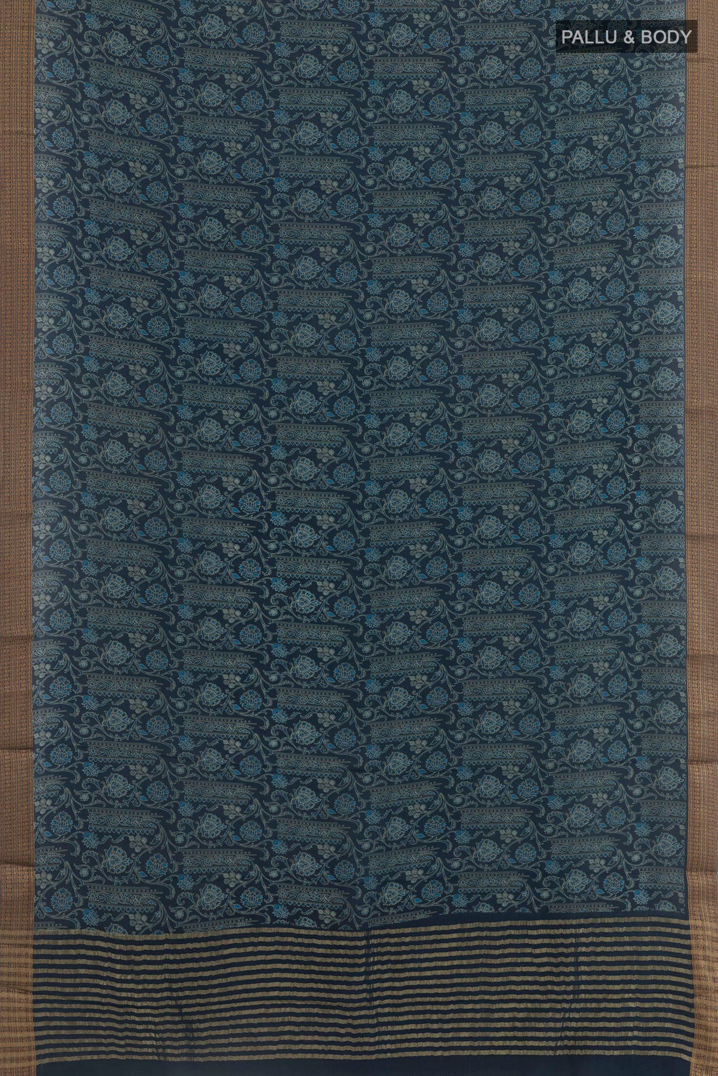 Flat view of Blue Crepe Saree with Printed design on the body and Zari Border. 
