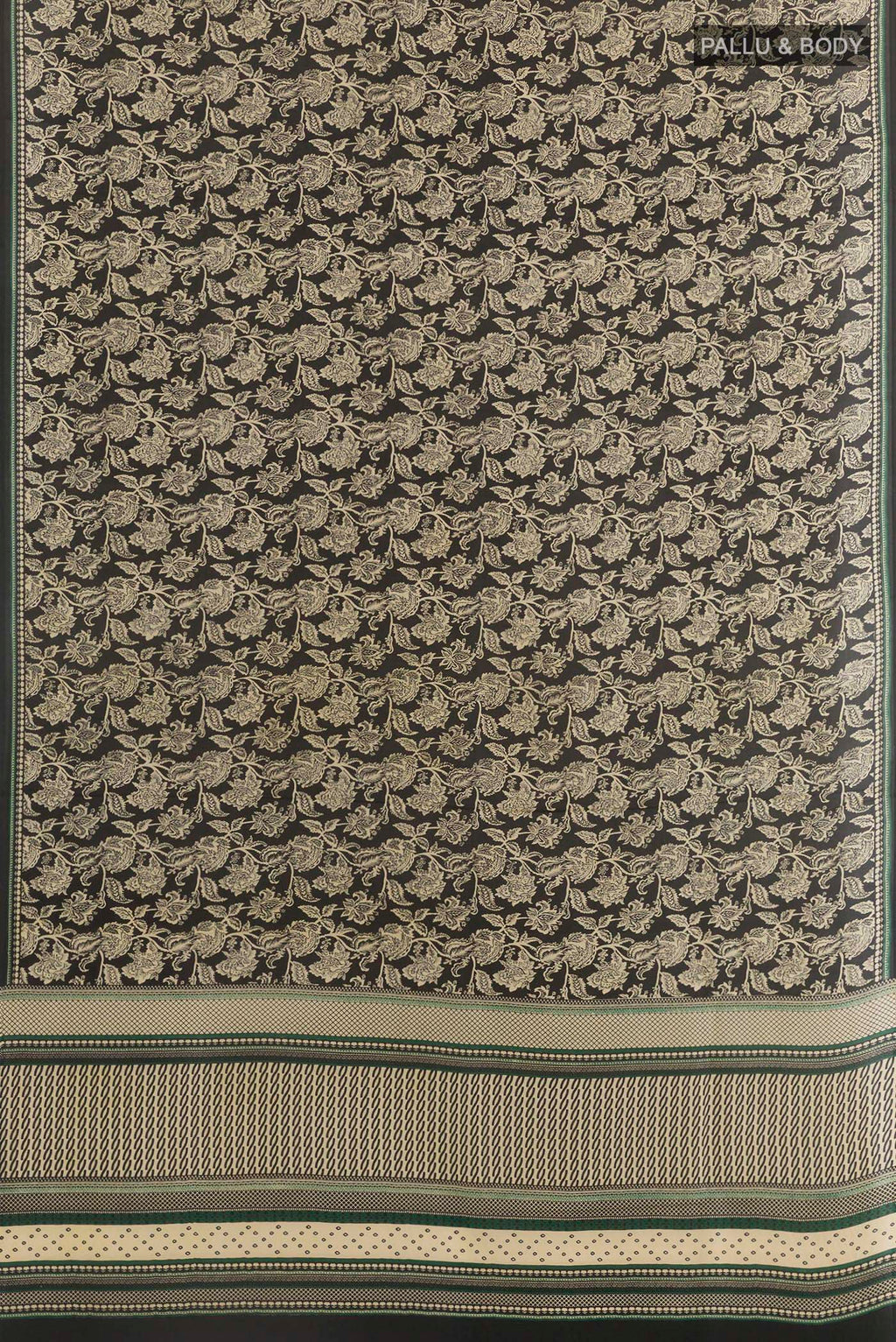 Flat view of Black Crepe Saree with Printed design on the body and Printed Border. 