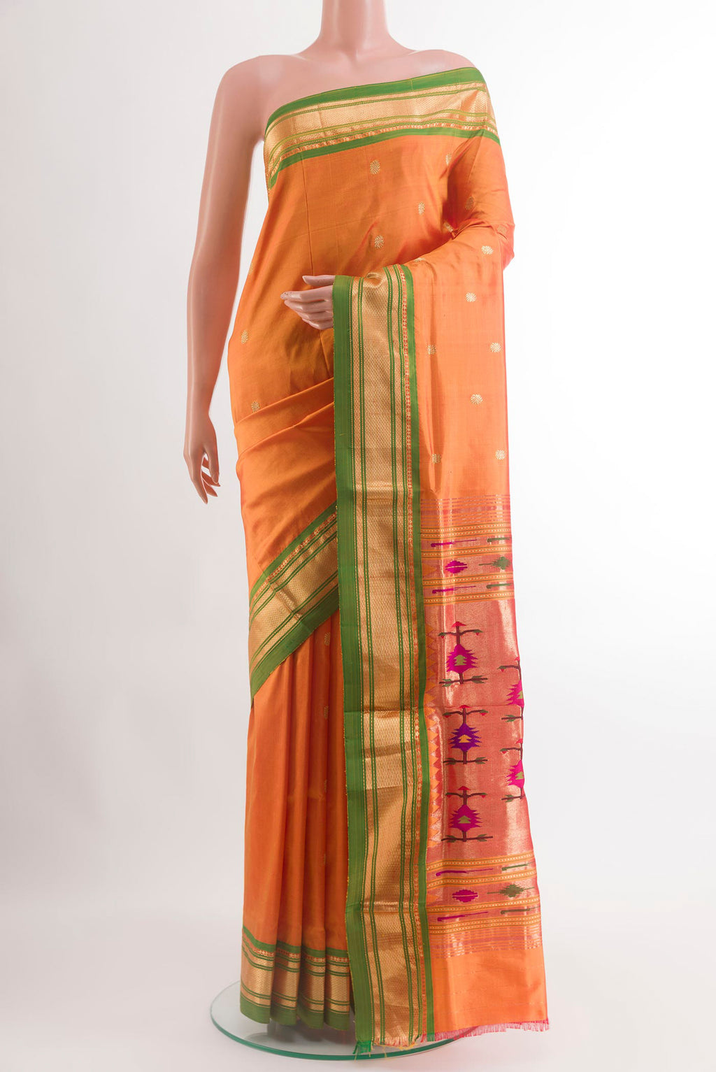 Orange Paithani Silk Saree with Zari Butta on the body and Zari Border.  displayed on a mannequin