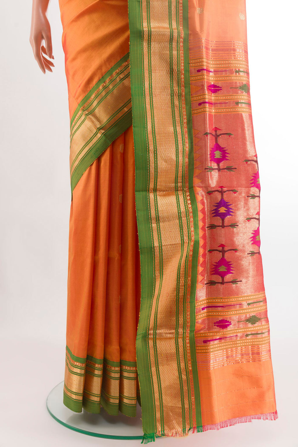 Pleats and pallu of Orange Paithani Silk Saree with Zari Butta on the body and Zari Border. 