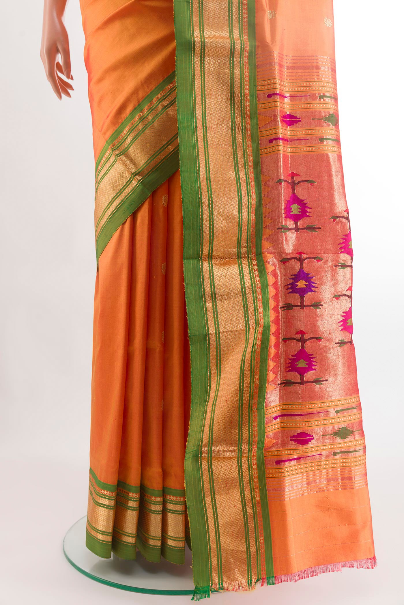 Pleats and pallu of Orange Paithani Silk Saree with Zari Butta on the body and Zari Border. 