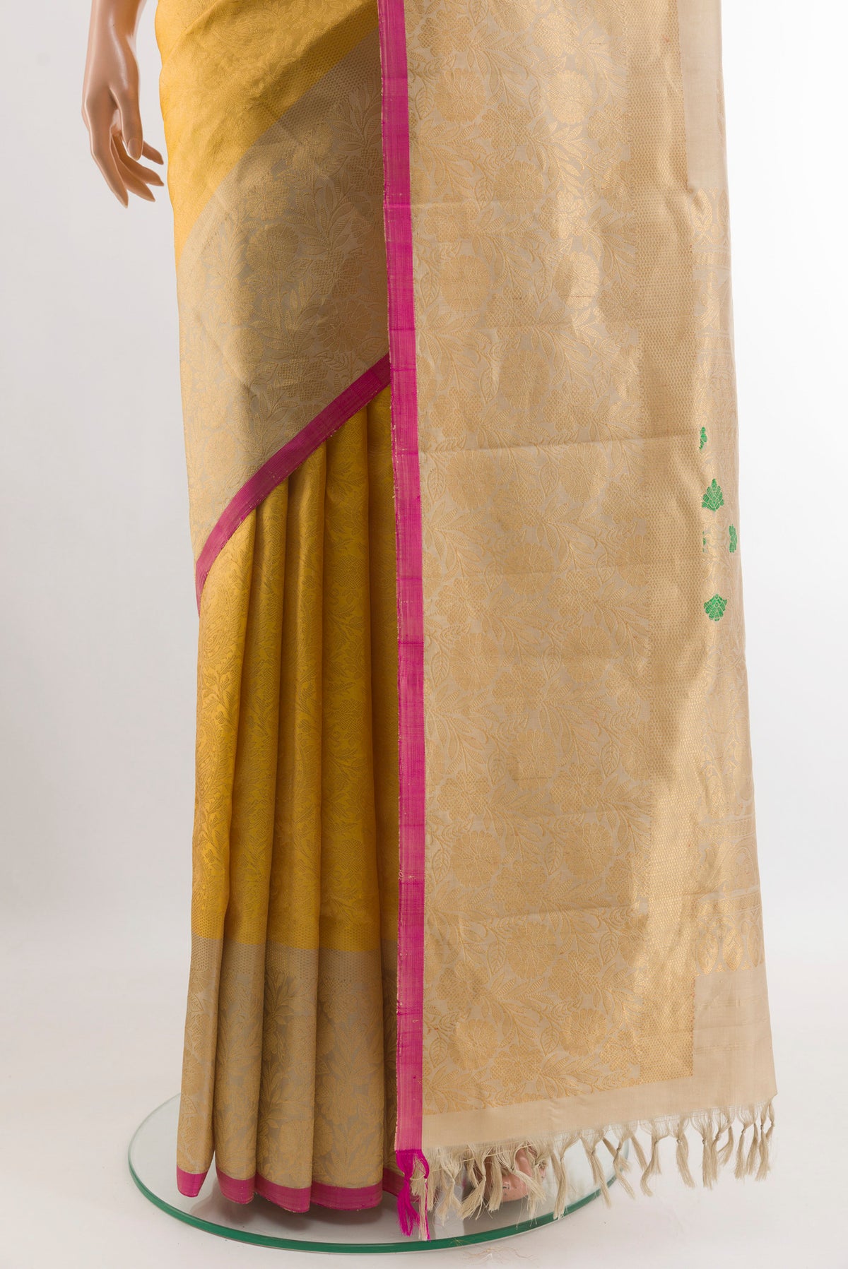 Pleats and pallu of Yellow Gadwal Silk Saree with Zari Brocade on the body and Fancy Border. 