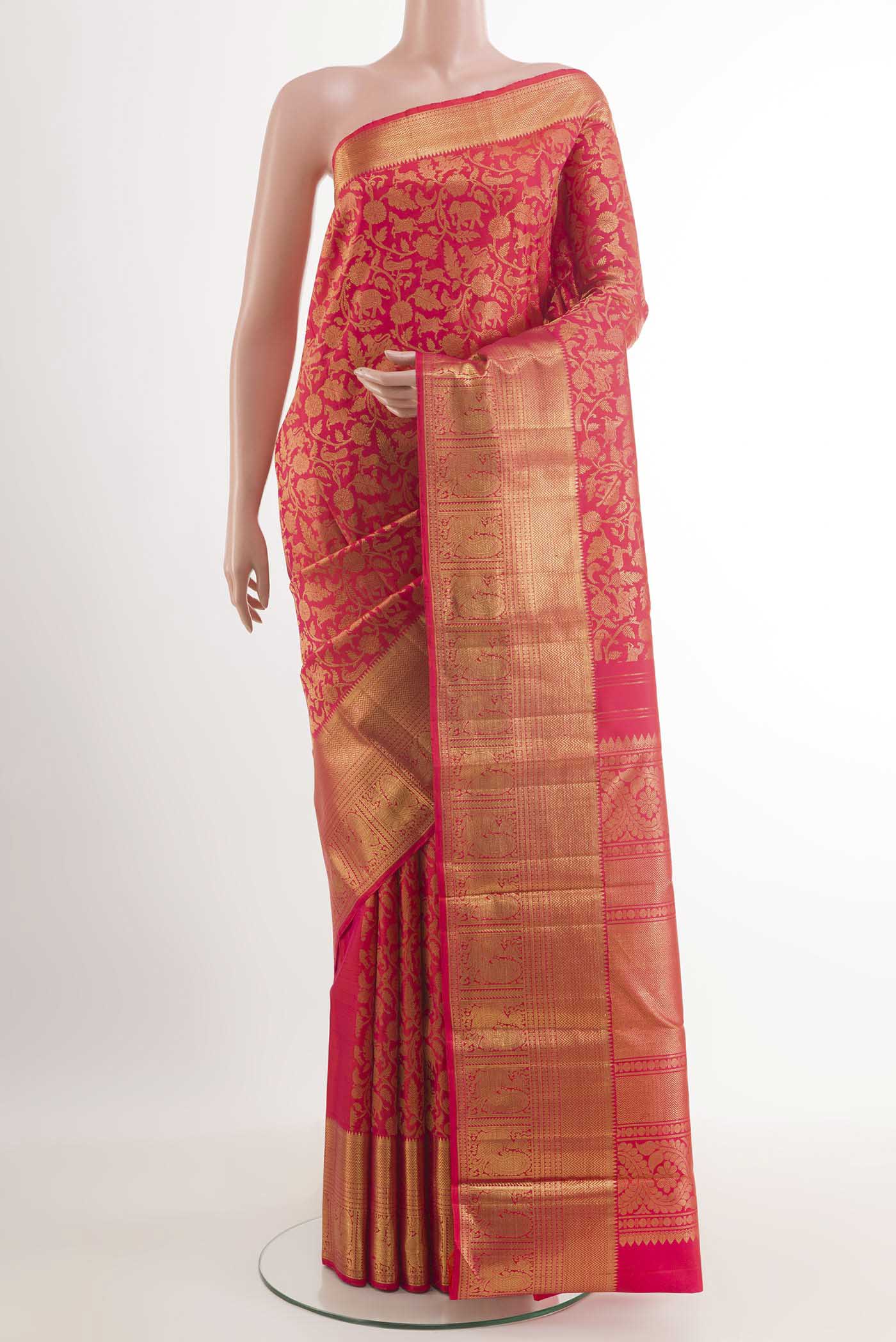 Pink Dual Tone Kanchipuram Silk Saree with Zari Brocade on the body and Zari Border.  displayed on a mannequin