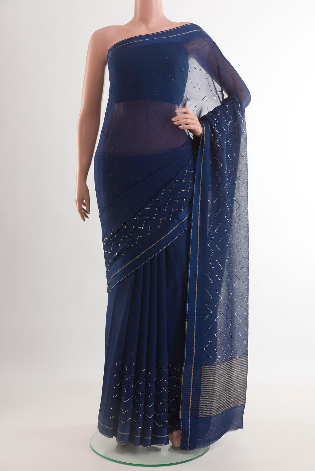Blue Mysore Chiffon Saree with Embroidery on the body and Zari Border.  displayed on a mannequin