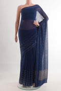 Blue Mysore Chiffon Saree with Embroidery on the body and Zari Border.  displayed on a mannequin