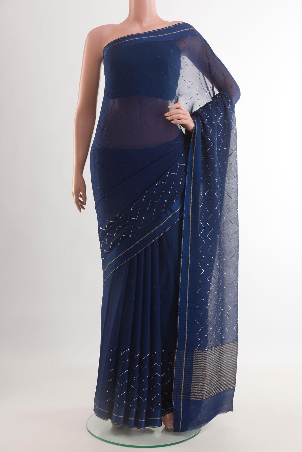 Blue Mysore Chiffon Saree with Embroidery on the body and Zari Border.  displayed on a mannequin