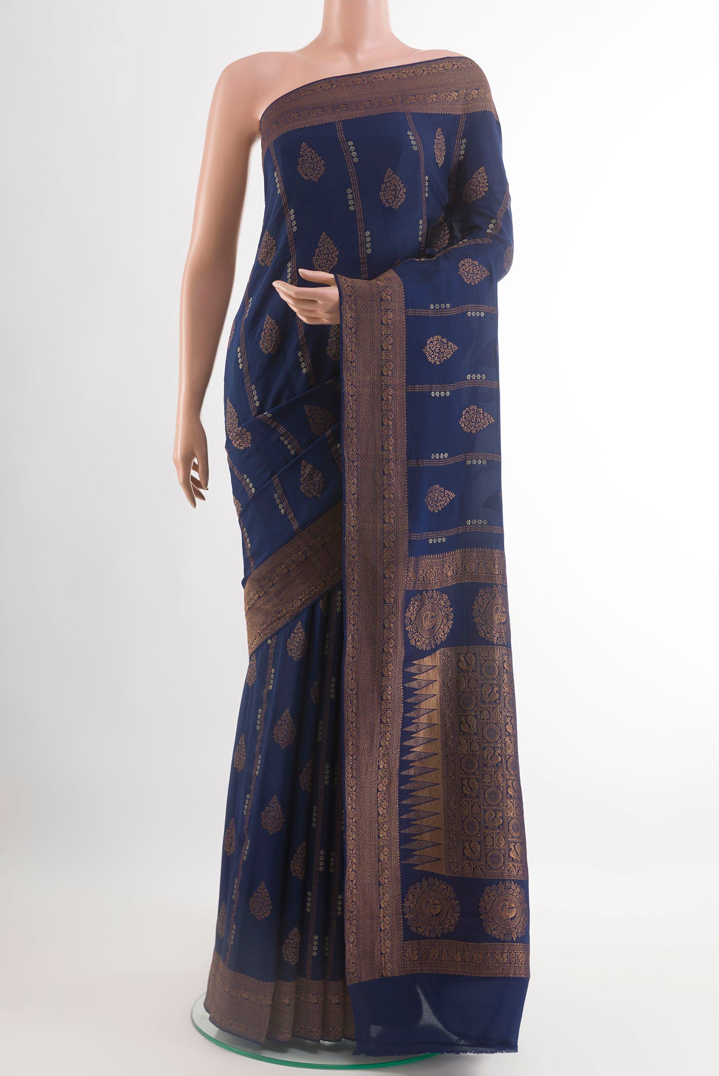 Blue Mysore Crepe Saree with Zari Butta on the body and Plain Border.  displayed on a mannequin