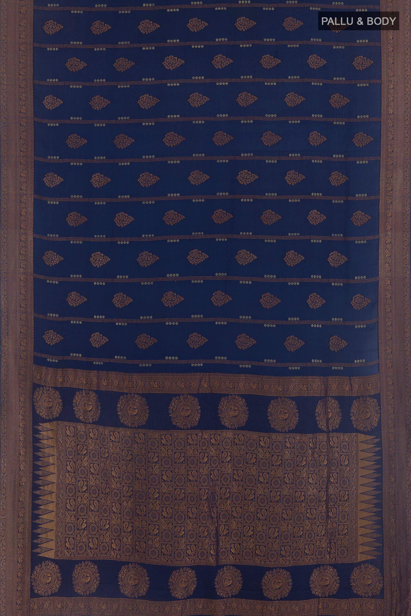 Flat view of Blue Mysore Crepe Saree with Zari Butta on the body and Plain Border. 
