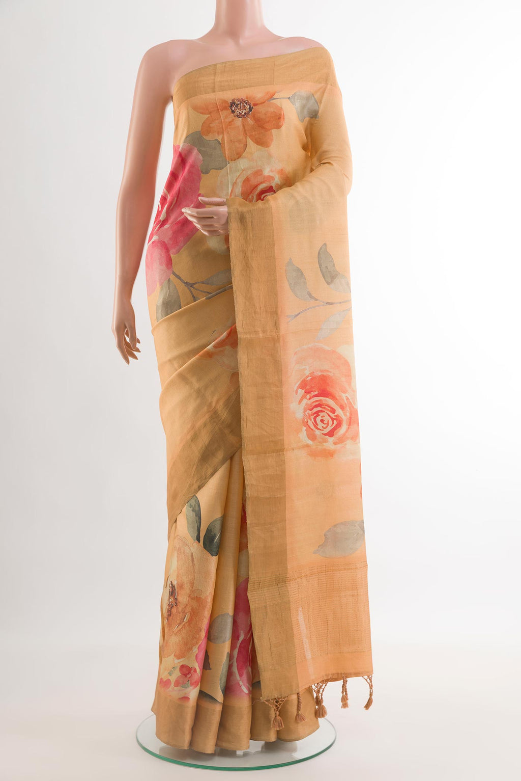 Sandal Tussar Silk Saree with Printed design on the body and Zari Border.  displayed on a mannequin