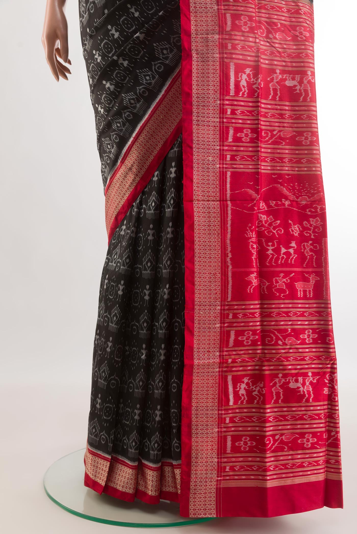 Pleats and pallu of Black Orissa Silk Saree with Pure Ikat on the body and Ikat Border. 