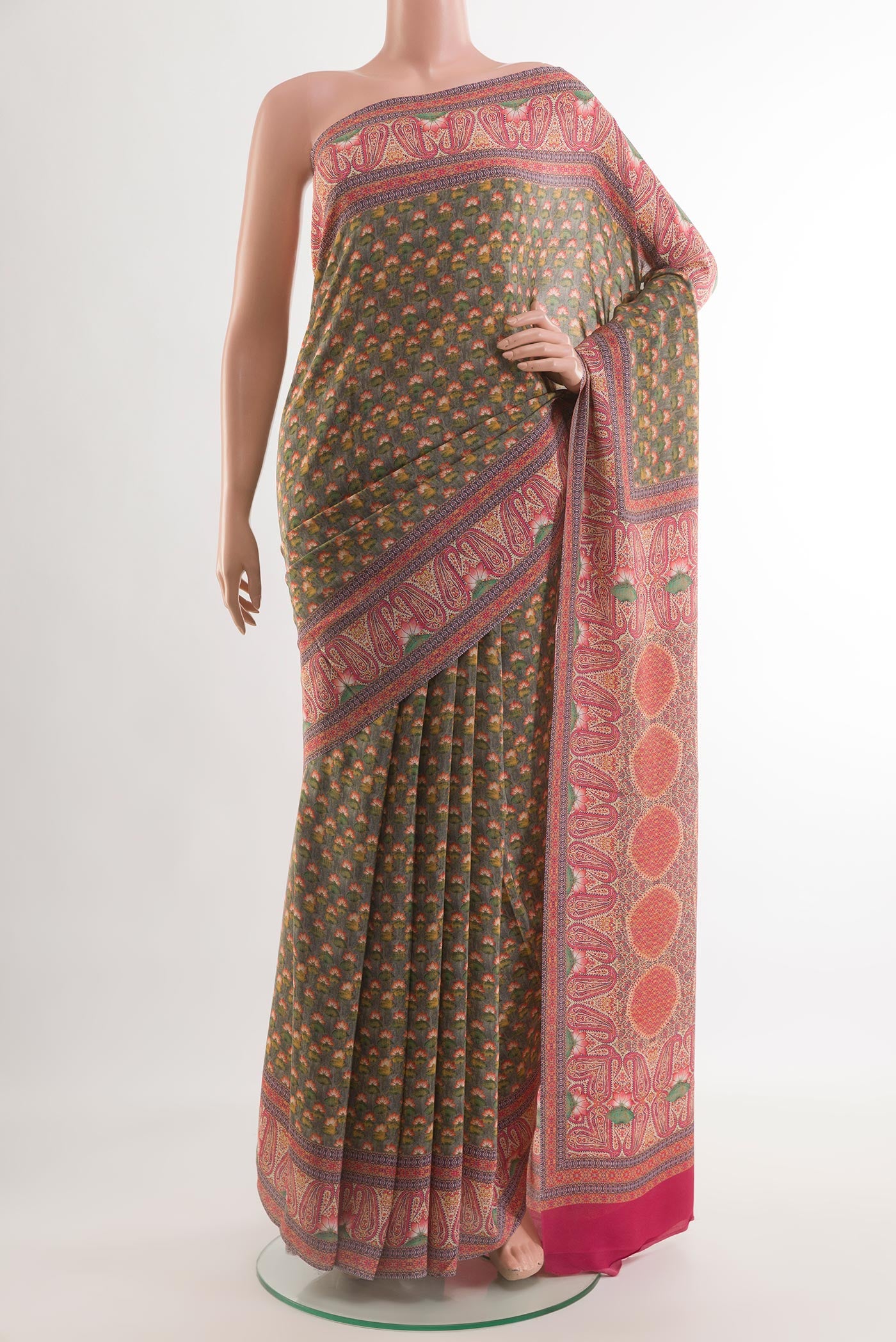 Grey Mysore Crepe Saree with Printed design on the body and Printed Border.  displayed on a mannequin