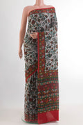 Grey Printed Silk Saree with Printed design on the body and Printed Border.  displayed on a mannequin