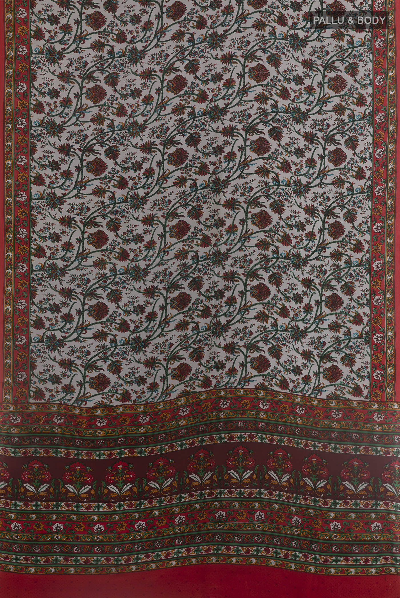 Flat view of Grey Printed Silk Saree with Printed design on the body and Printed Border. 