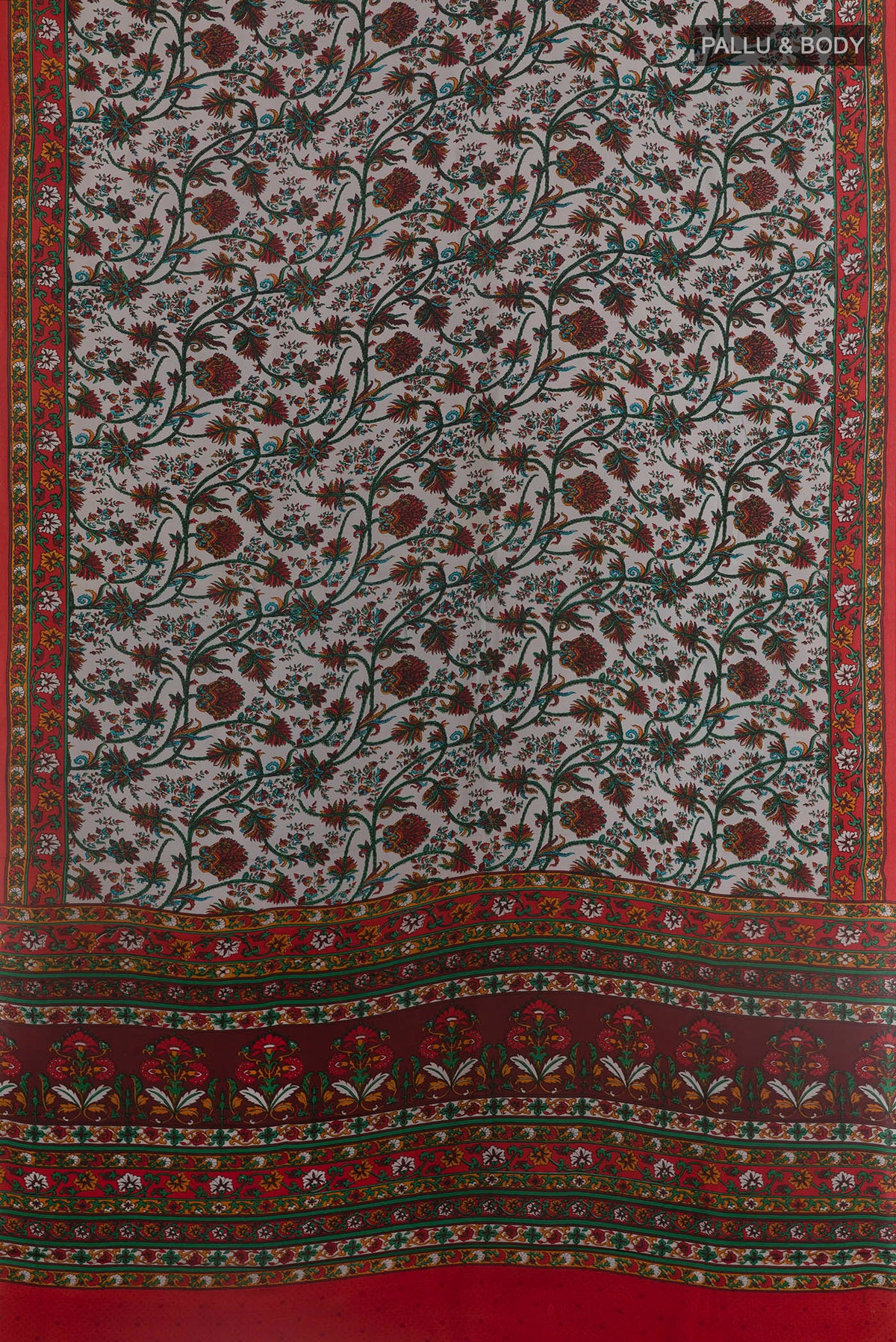 Flat view of Grey Printed Silk Saree with Printed design on the body and Printed Border. 