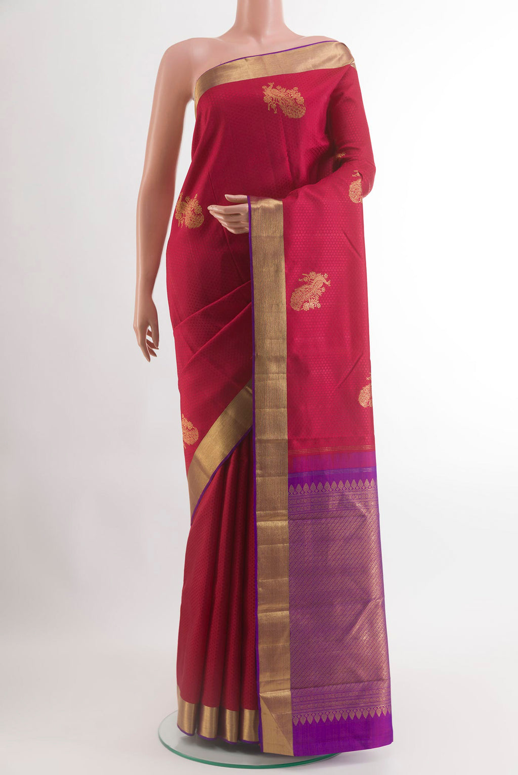 Maroon Kanjivaram Silk Saree with Jacquard With Zari Butta on the body and Zari Border.  displayed on a mannequin