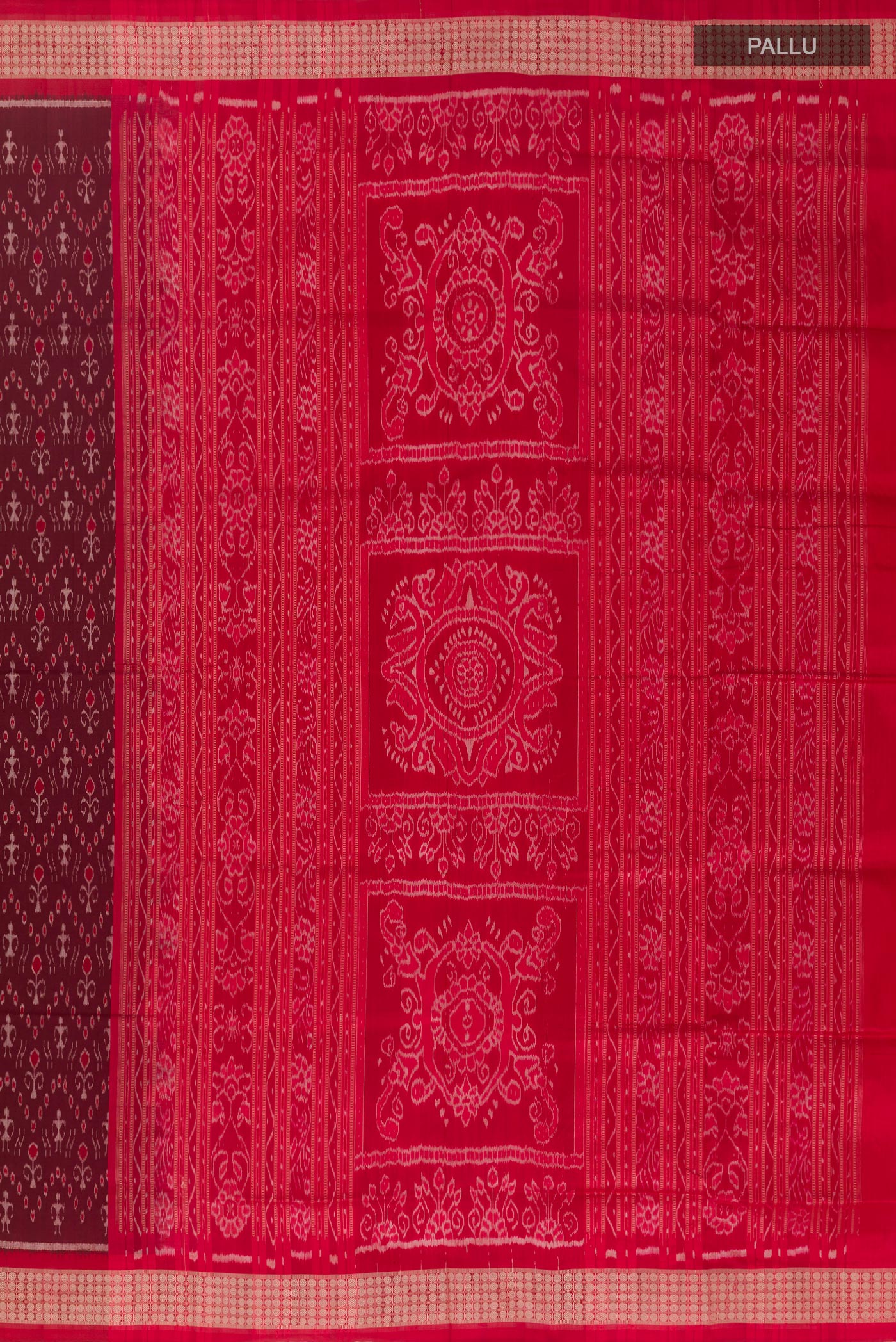 Close up image of the pallu of Maroon Orissa Silk Saree with Pure Ikat on the body and Ikat Border. 
