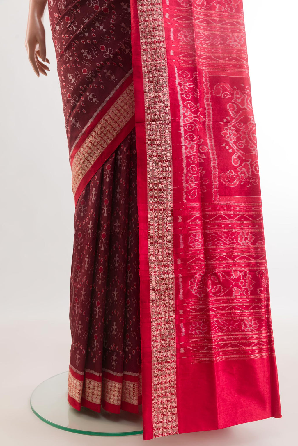 Pleats and pallu of Maroon Orissa Silk Saree with Pure Ikat on the body and Ikat Border. 