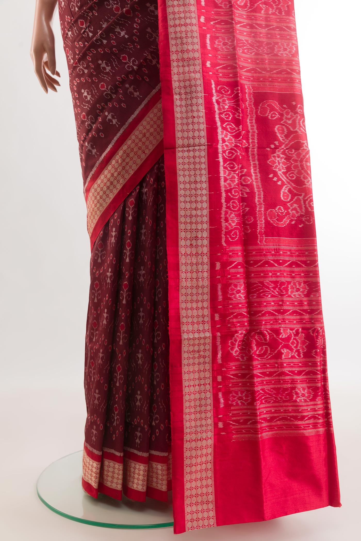 Pleats and pallu of Maroon Orissa Silk Saree with Pure Ikat on the body and Ikat Border. 