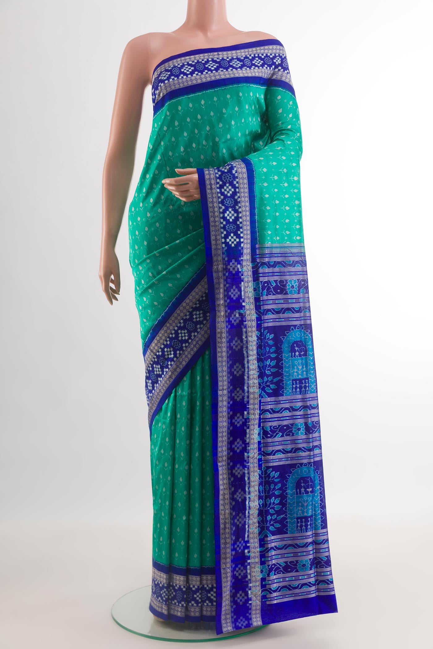 Sea Green Orissa Silk Saree with Pure Ikat on the body and Ikat Border.  displayed on a mannequin