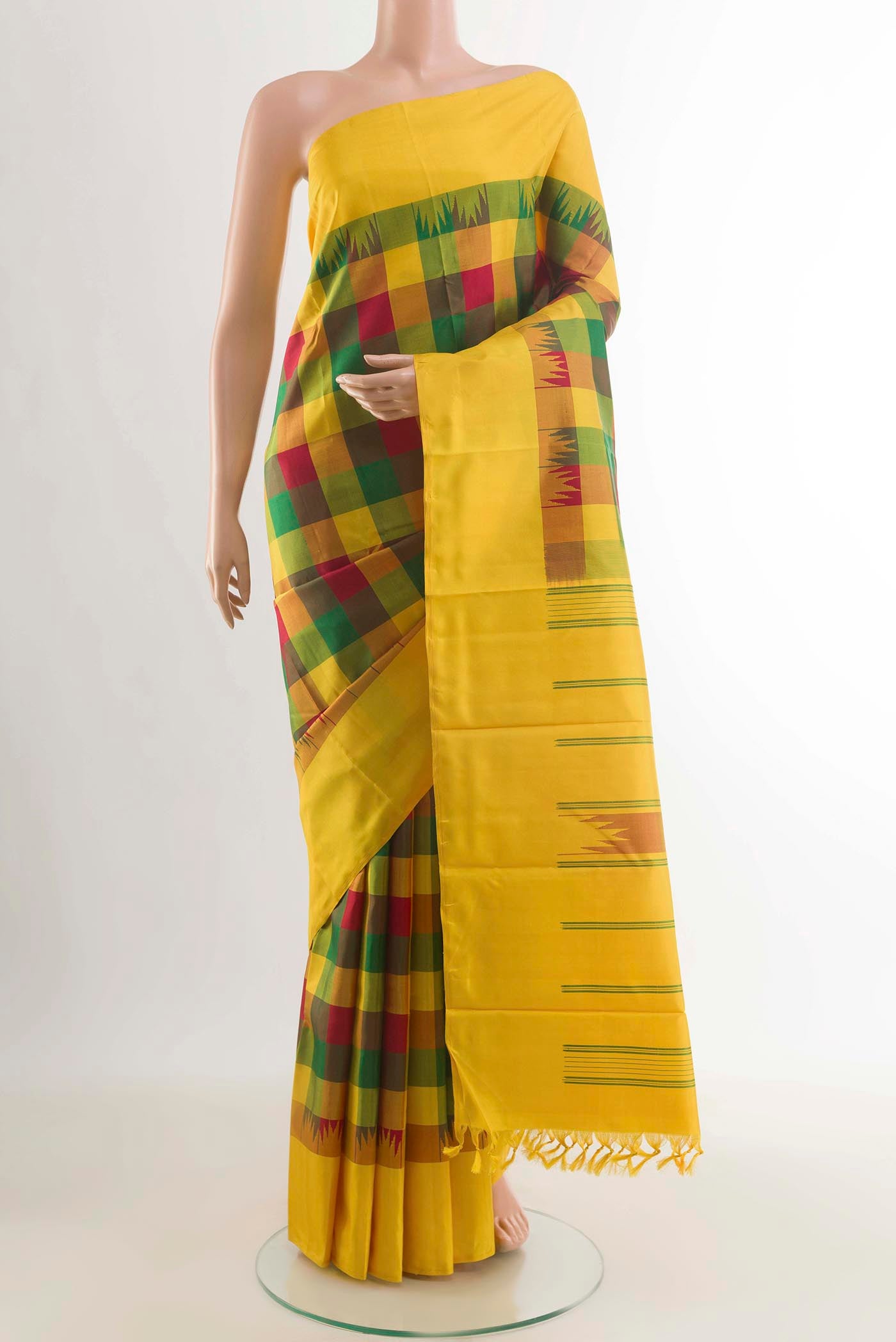 Multi Color Kanchipuram Silk Saree with Checked design on the body and Plain Border displayed on a mannequin