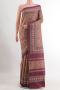 Beige Tussar Saree with Printed design on the body and Plain Border.  displayed on a mannequin