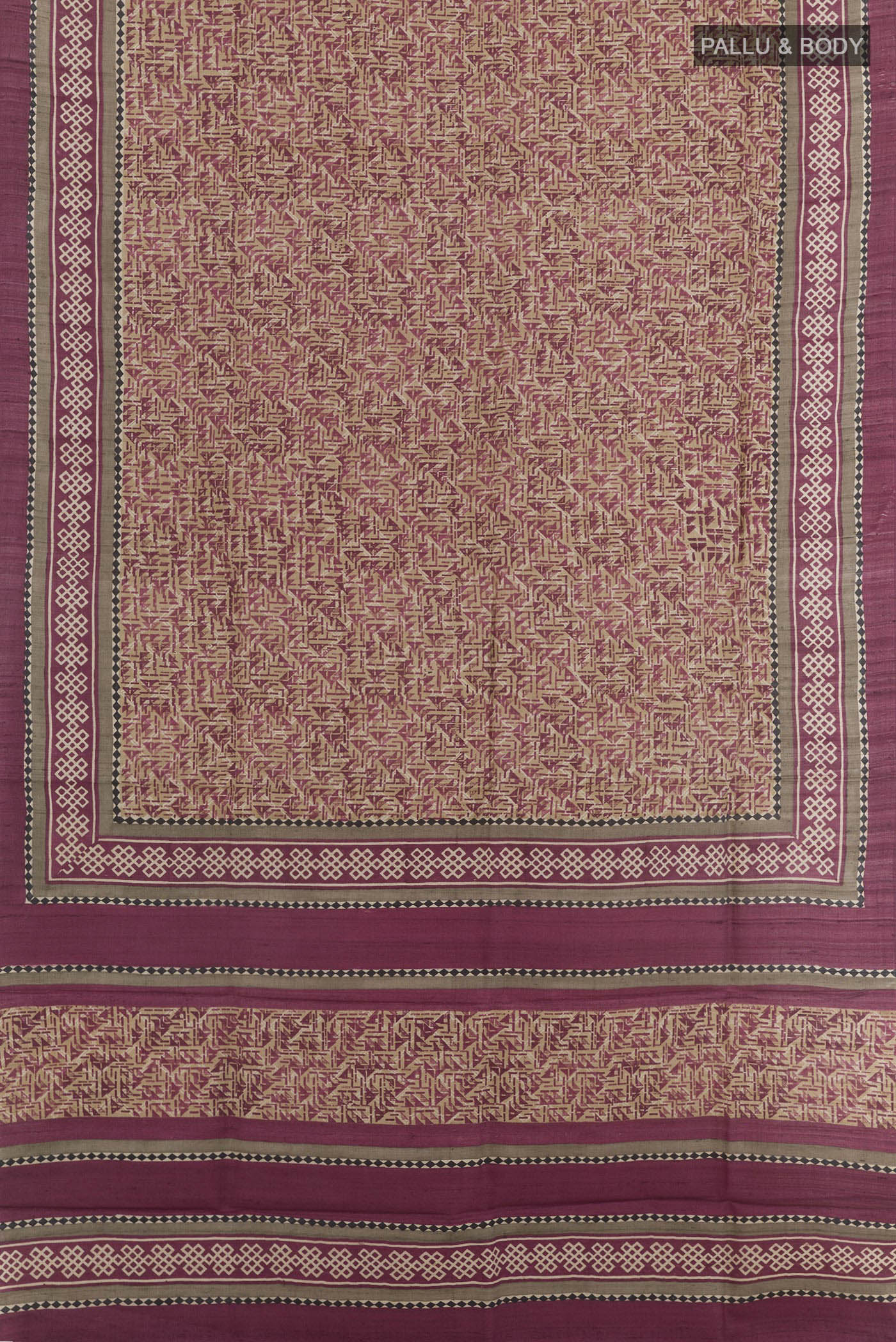 Flat view of Beige Tussar Saree with Printed design on the body and Plain Border. 
