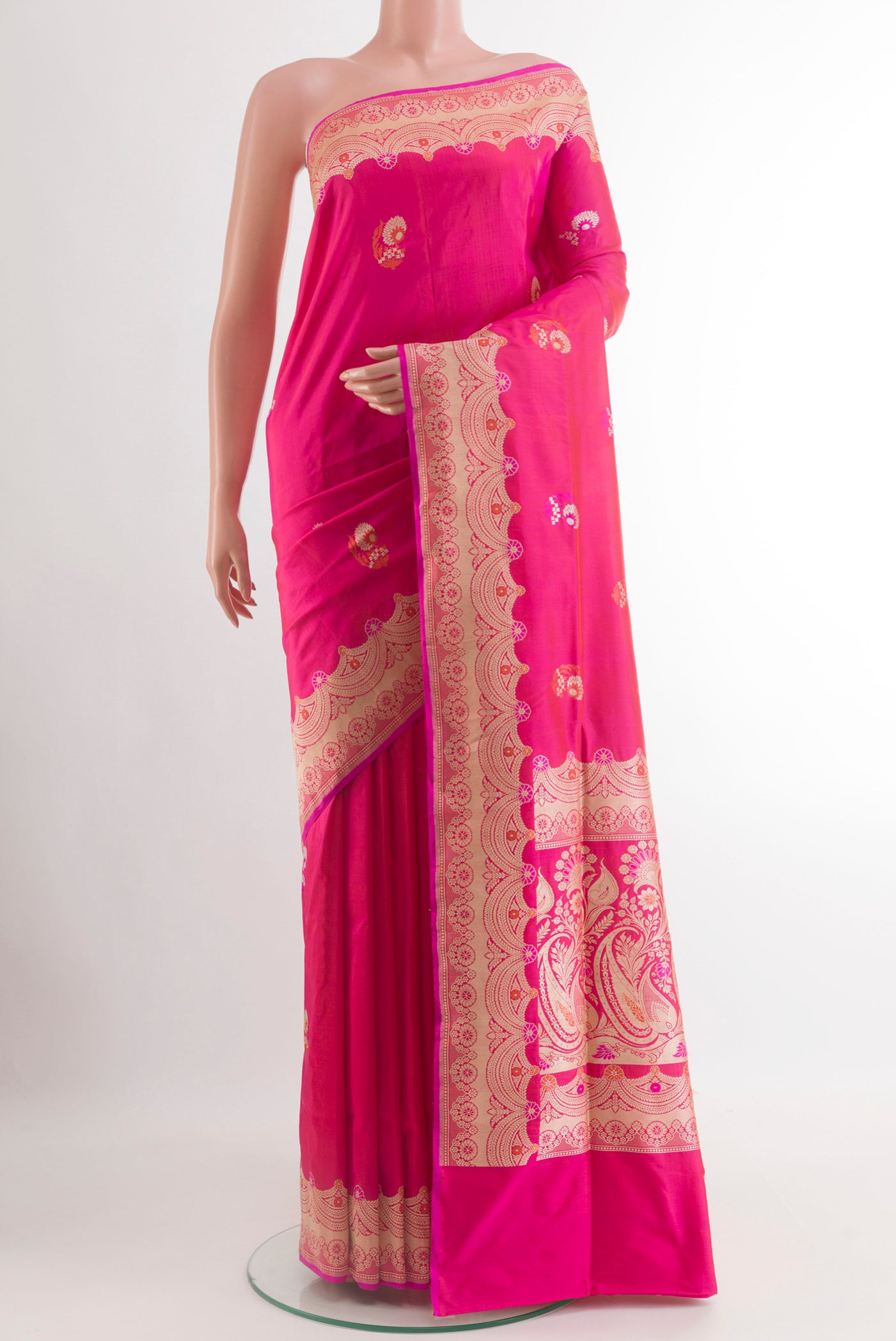 Pink Banarasi Silk Saree with Zari Butta on the body and Zari Border.  displayed on a mannequin