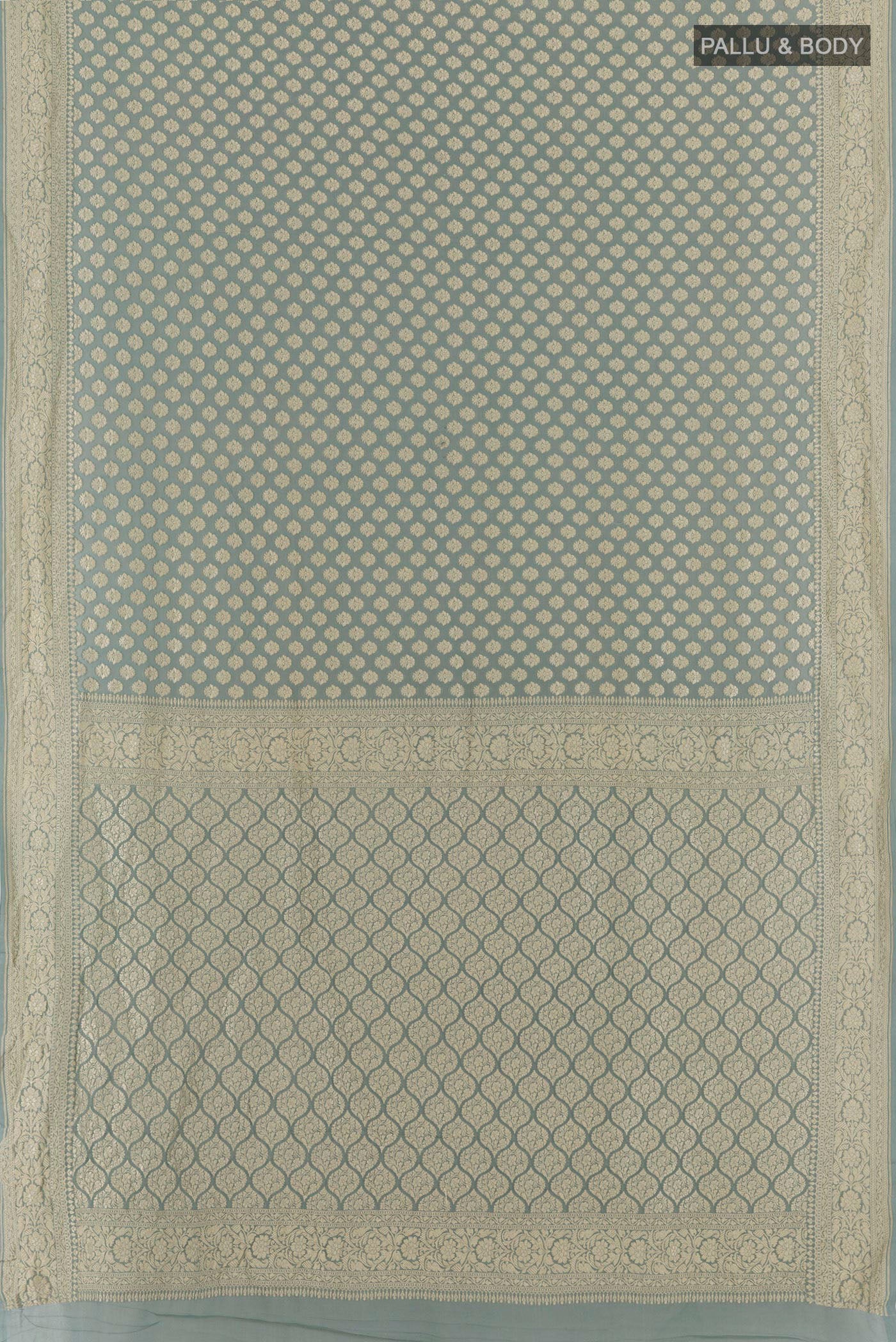 Flat view of Grey Banarasi Georgette Saree with Zari Butta on the body and Zari Border. 