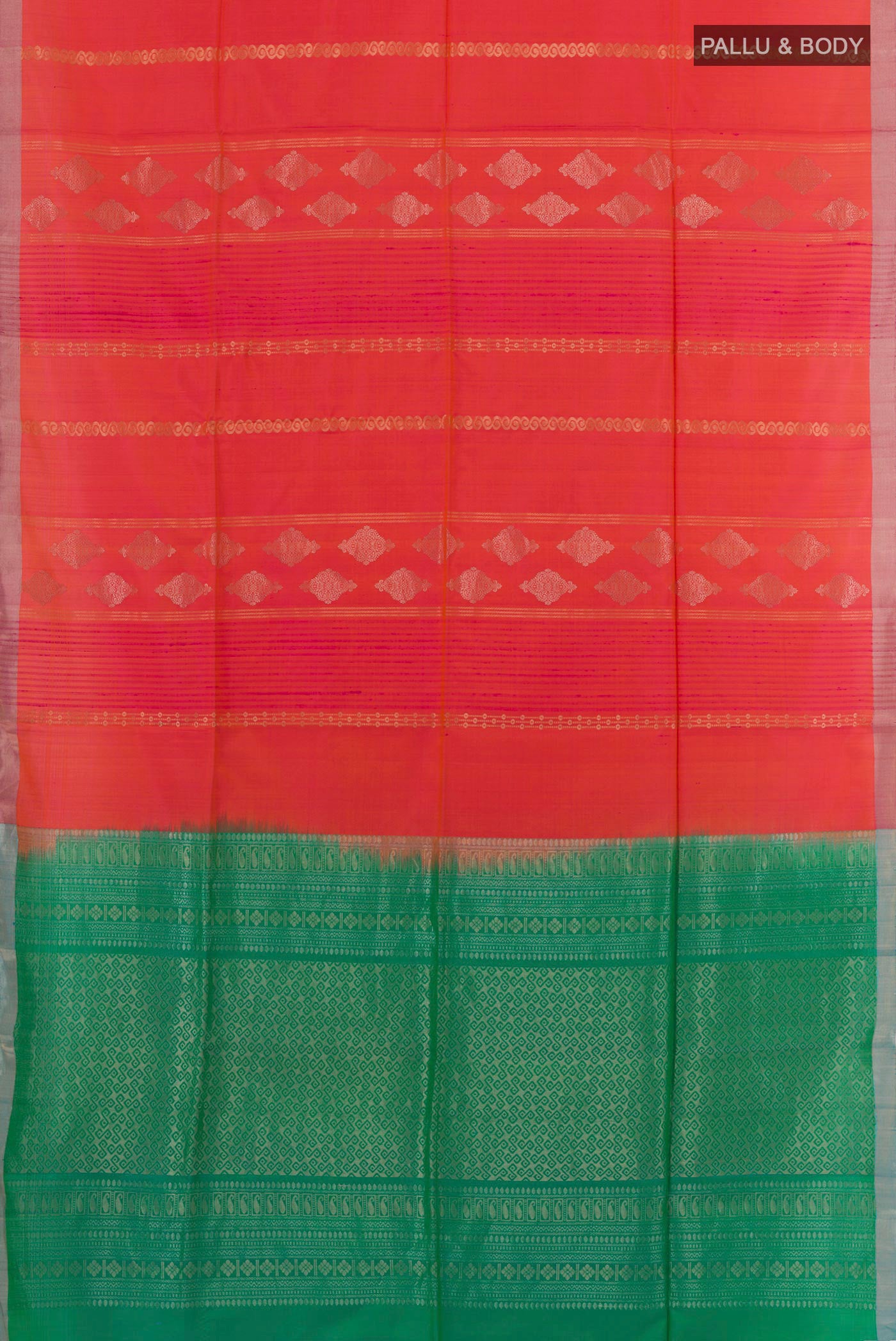 Flat view of Brick Orange Soft Silk Saree with Zari Butta on the body and Zari Border. 