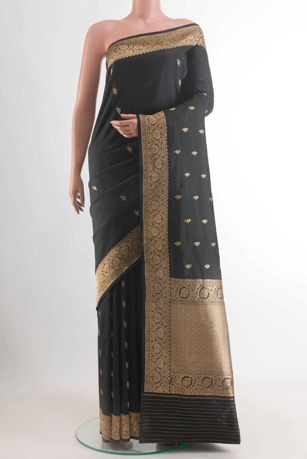 Black Banarasi Katan Silk Saree with Zari Butta on the body and Zari Border.  displayed on a mannequin