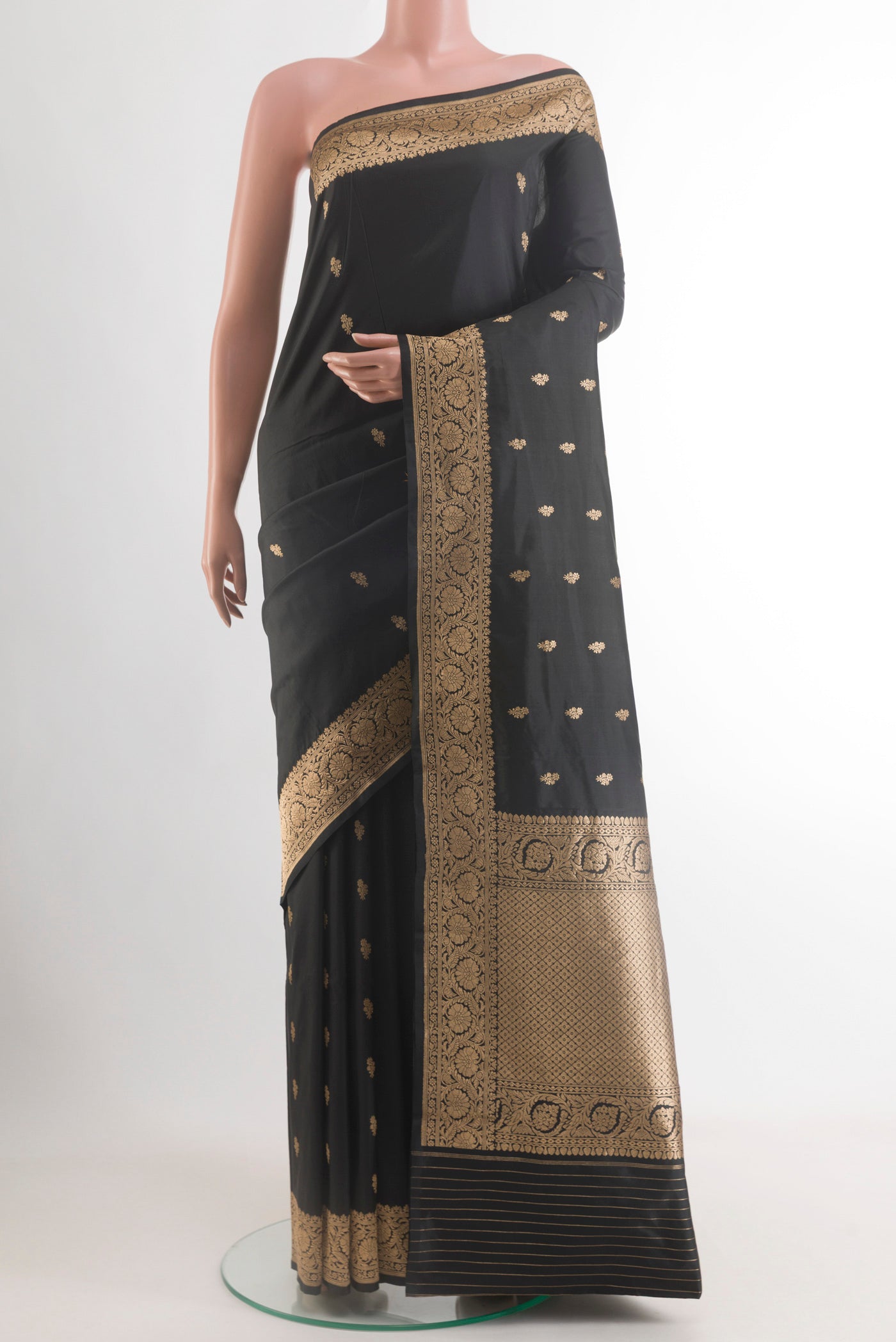 Black Banarasi Katan Silk Saree with Zari Butta on the body and Zari Border.  displayed on a mannequin