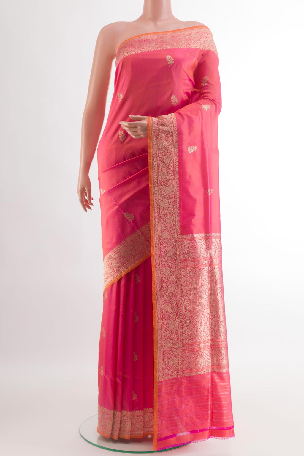 Pink Banarasi Silk Saree with Zari Butta on the body and Zari Border.  displayed on a mannequin