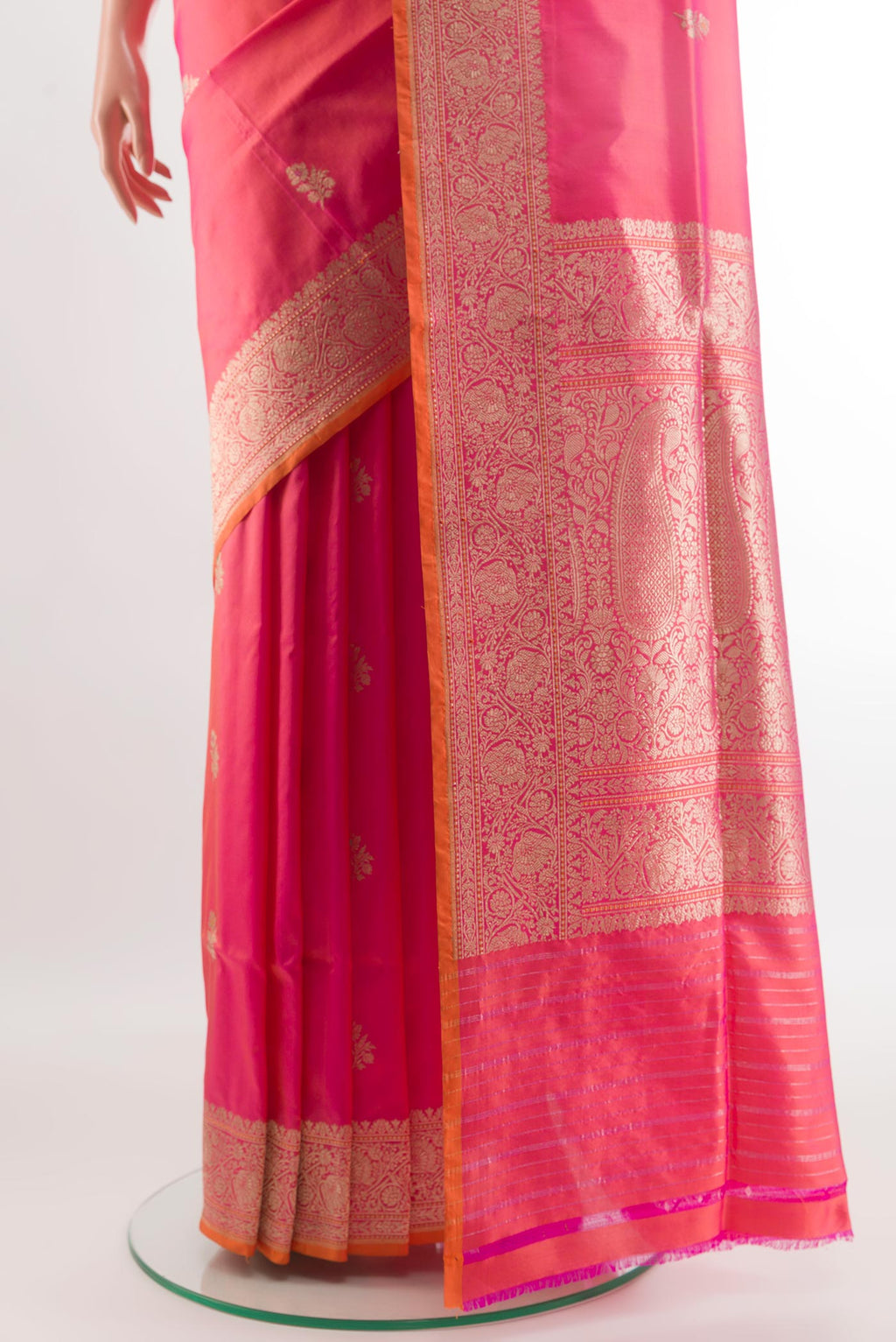 Pleats and pallu of Pink Banarasi Silk Saree with Zari Butta on the body and Zari Border. 