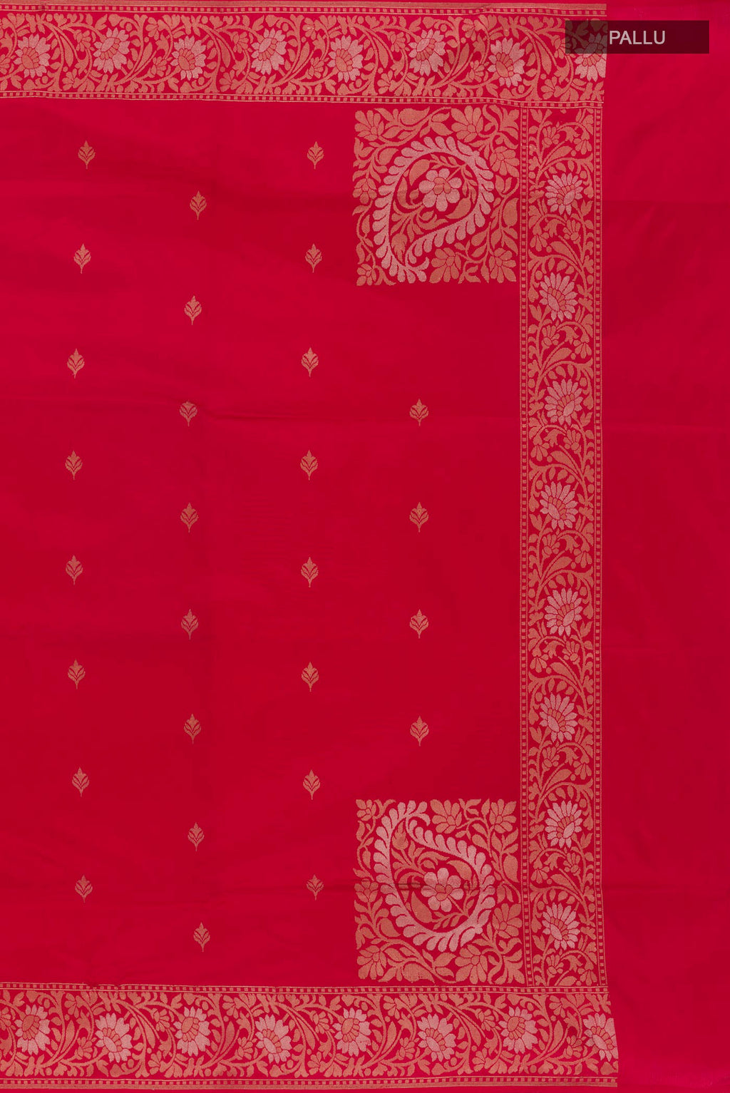 Close up image of the pallu of Red Banarasi Silk Saree with Zari Butta on the body and Zari Border. 