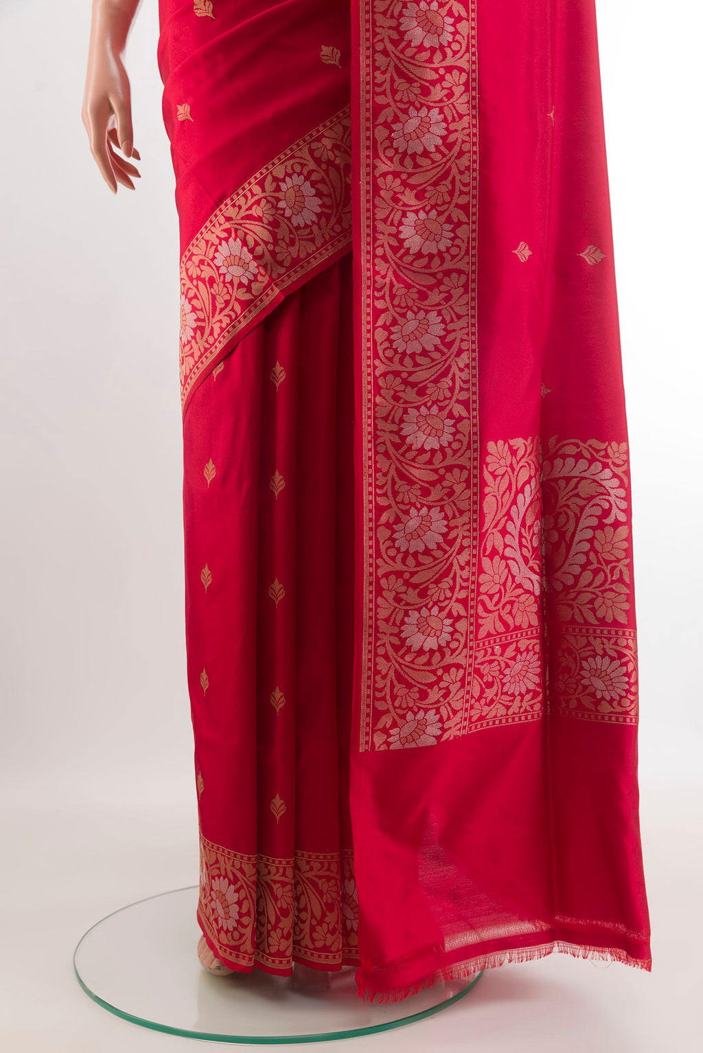 Pleats and pallu of Red Banarasi Silk Saree with Zari Butta on the body and Zari Border. 