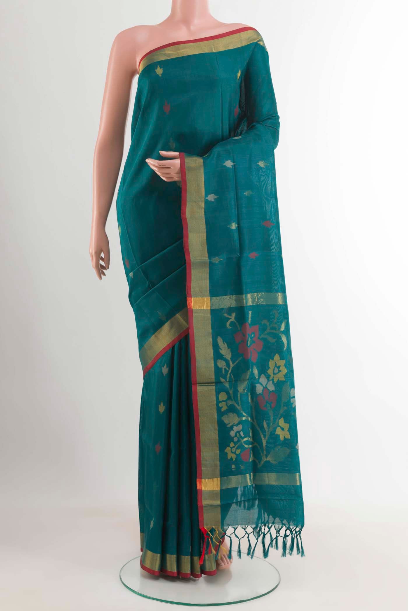 Teal Uppada Silk Saree with Zari Butta on the body and Zari Border displayed on a mannequin